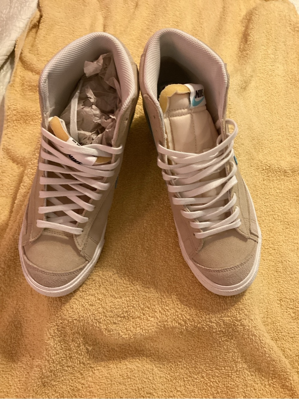 Nike Women’s High-Top Sneakers in Cream and White with Light Blue Accent